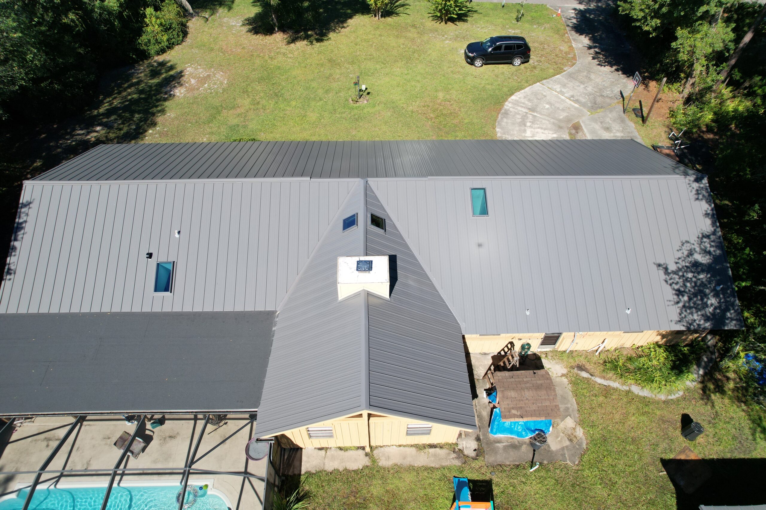 Metal Roof on Residential Home with a pool